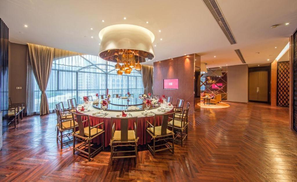 Maison New Century Hotel Dongguan Дунгуань Экстерьер фото