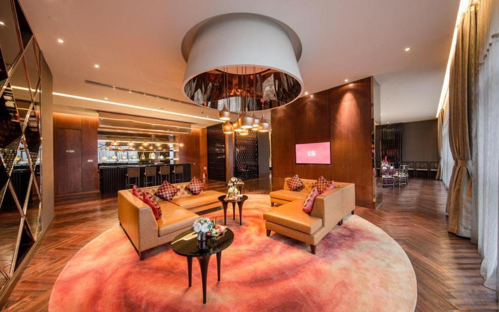 Maison New Century Hotel Dongguan Дунгуань Экстерьер фото