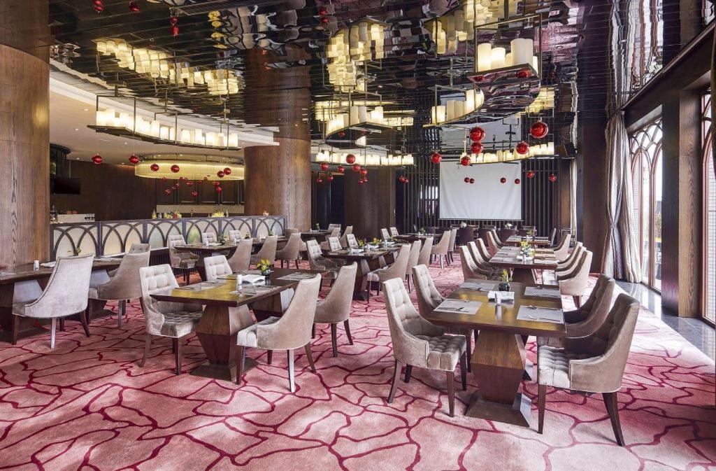 Maison New Century Hotel Dongguan Дунгуань Экстерьер фото