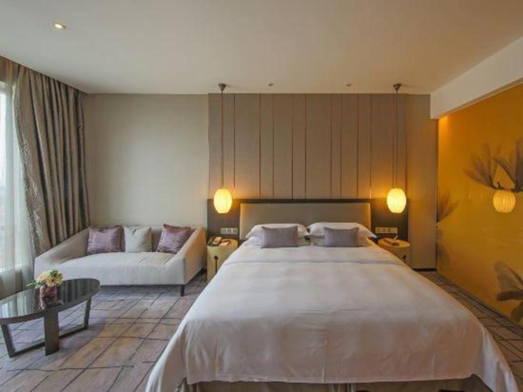 Maison New Century Hotel Dongguan Дунгуань Экстерьер фото