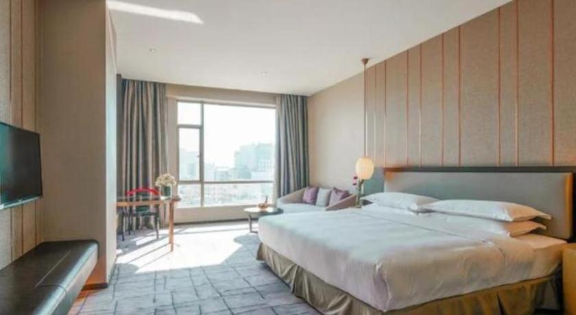 Maison New Century Hotel Dongguan Дунгуань Экстерьер фото